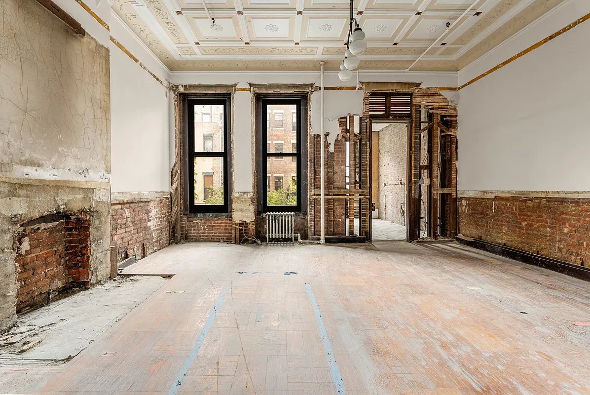 Unrenovated room with original plaster ceiling at 128 West 121st Street