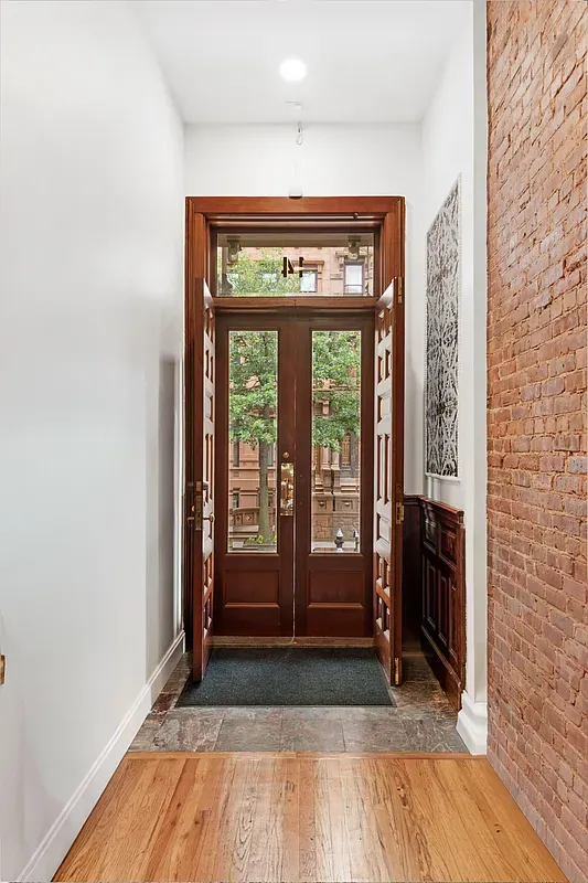 Entry hall with original double doors at 14 West 121st Street