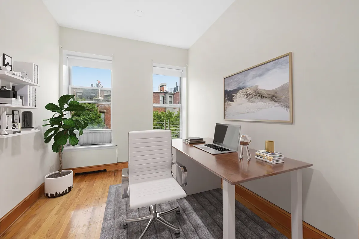 Virtually staged home office with two windows at 14 West 121st Street