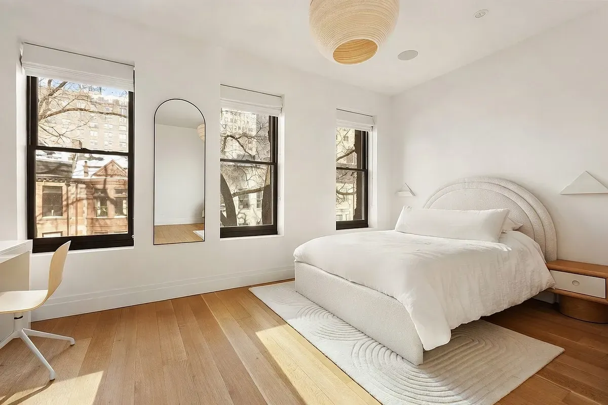 Bedroom with three windows at 26 West 95th Street