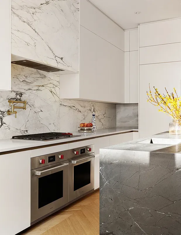 Kitchen range and marble backsplash at 26 West 95th Street