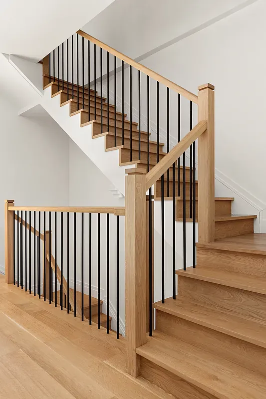 Oak staircase between floors at 26 West 95th Street