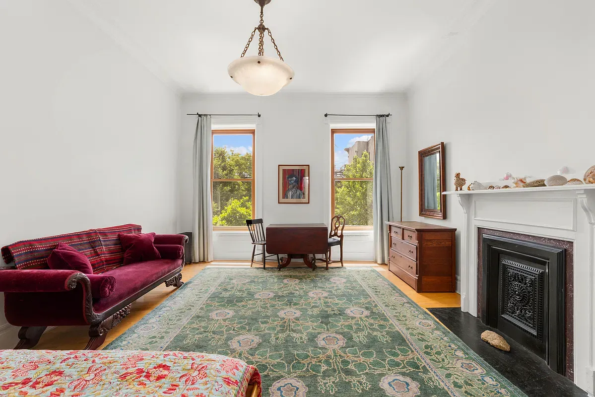 Sitting room with fireplace at 360 West 121st Street