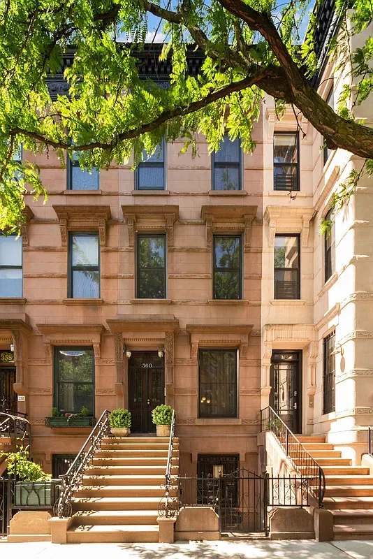 Townhouse facade and stoop at 360 West 121st Street in Harlem