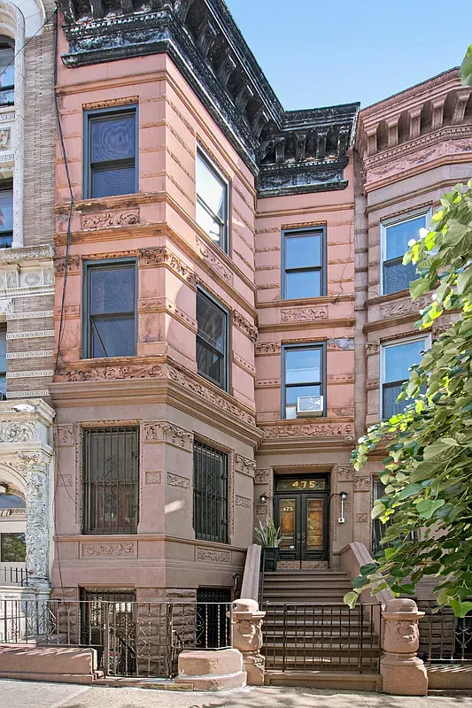 Brownstone facade and stoop at 475 West 144th Street in Hamilton Heights