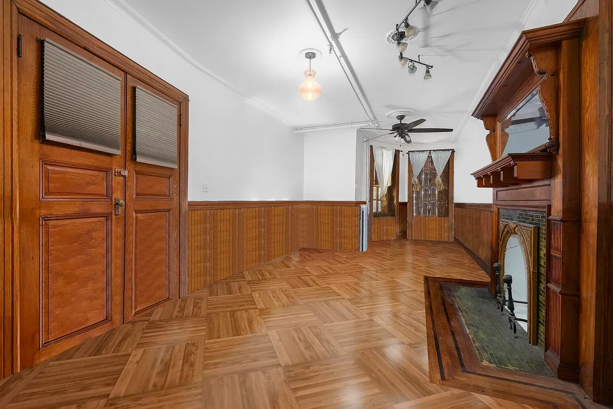 Parlor floor with pocket doors and wainscoting at 475 West 144th Street