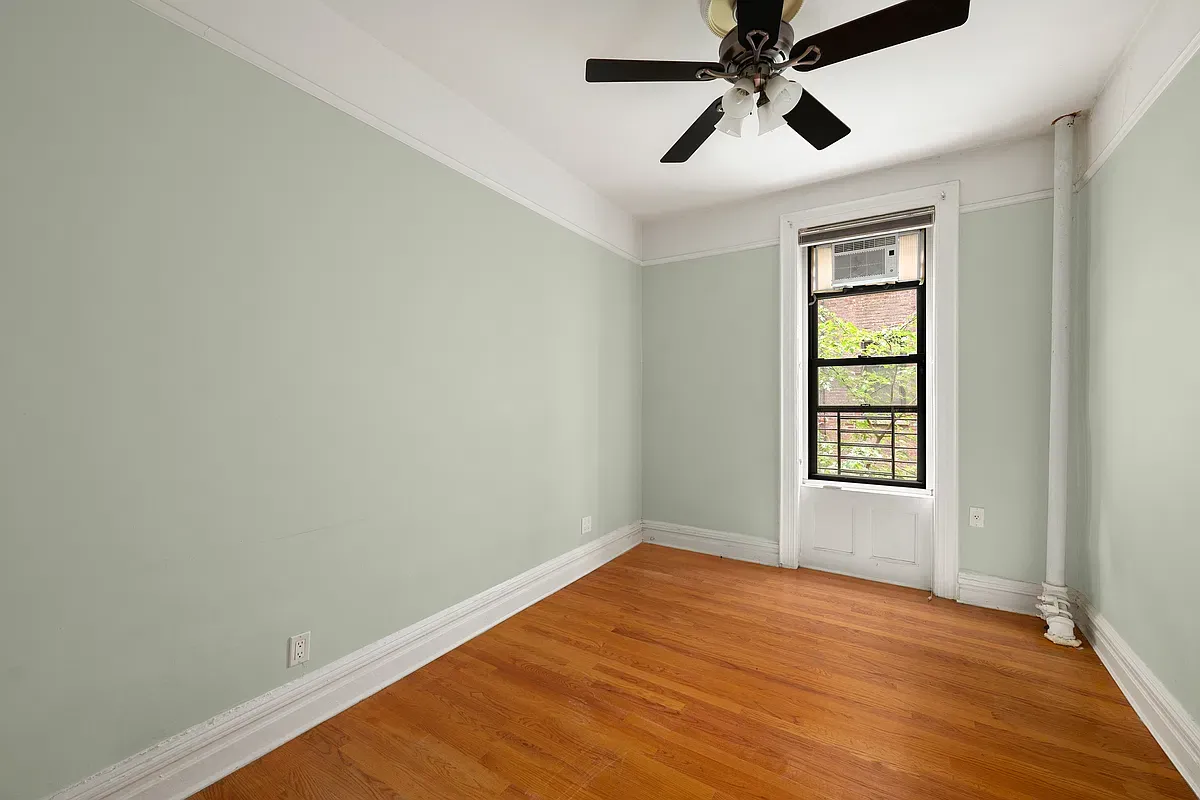 Empty bedroom at 523 West 121st Street #2
