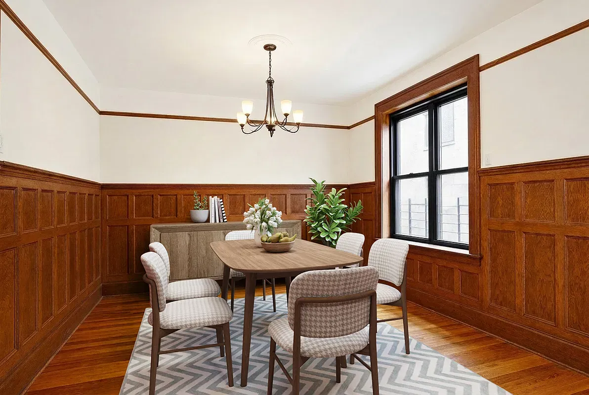 Virtually staged dining room with oak wainscoting at 523 West 121st Street #2