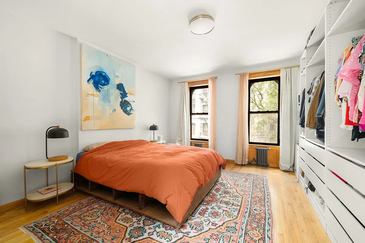 Bedroom with wood floors at 642 West 138th Street