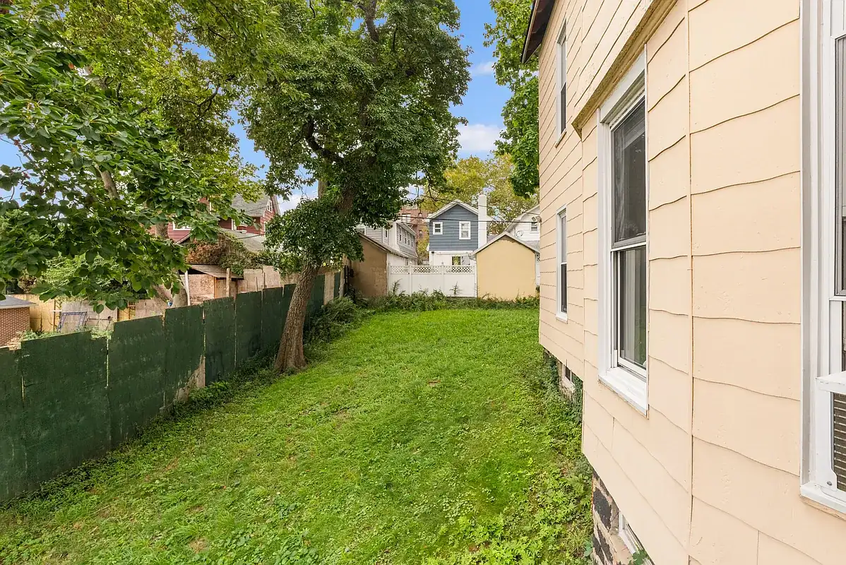 Side yard and lawn at 6655 Sedgwick Place