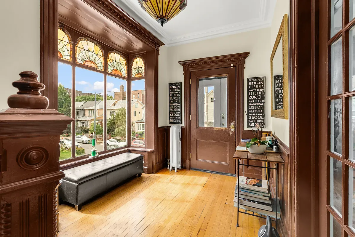 Entry hall with stained glass windows at 6655 Sedgwick Place