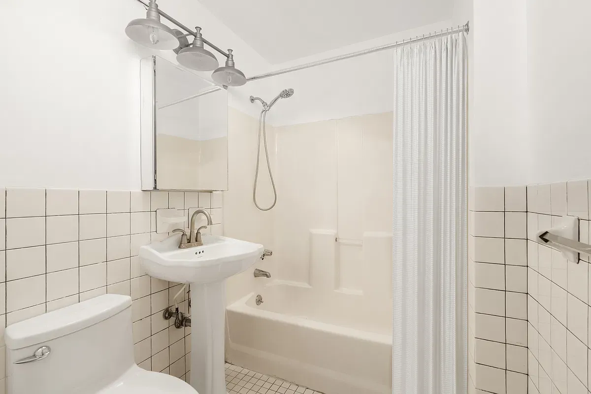 Bathroom with tub and shower at 904 Gates Avenue